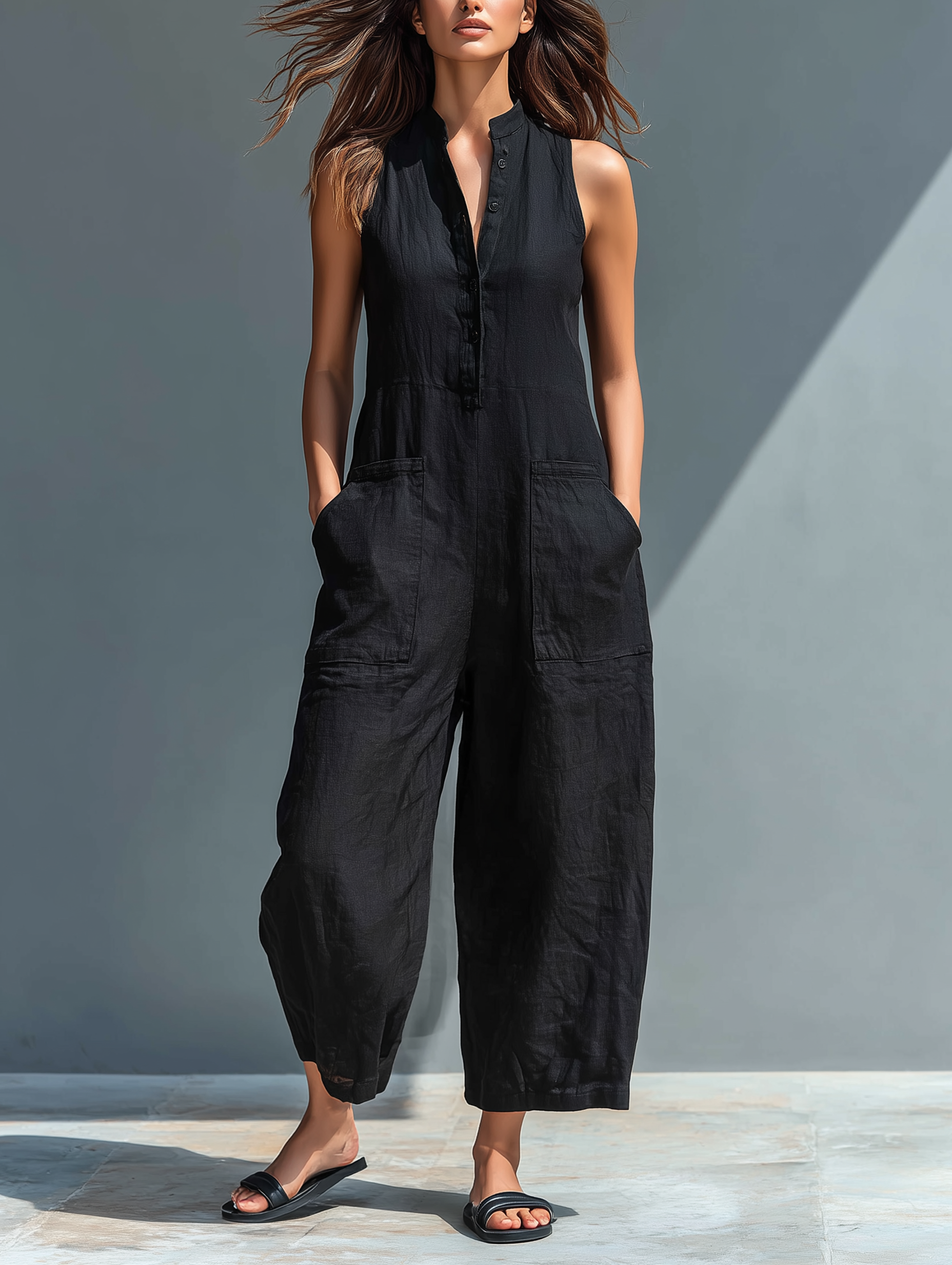 Trendé™ | Livia Ärmelloser Jumpsuit mit hohem Kragen und Knöpfen