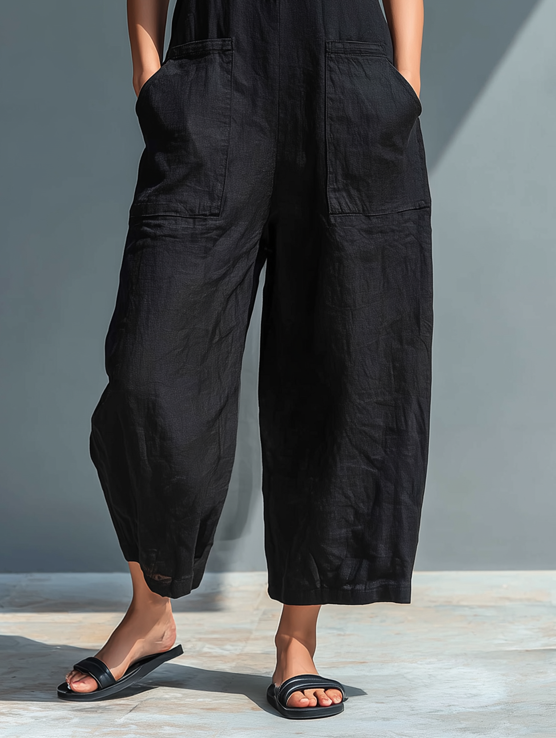Trendé™ | Livia Ärmelloser Jumpsuit mit hohem Kragen und Knöpfen